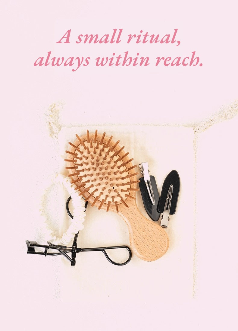 Side profile view of CLARITY wooden cushion hairbrush showing natural bristles HERRITE