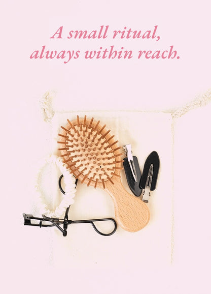 Side profile view of CLARITY wooden cushion hairbrush showing natural bristles HERRITE